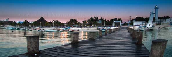 Puerto Morelos Villas | The pier and lighthouse is where you will also find the fishing and dive boats moored.