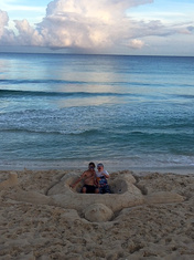 Building a giant Sand Turtle before the waves and sky | Secret Beach Villas