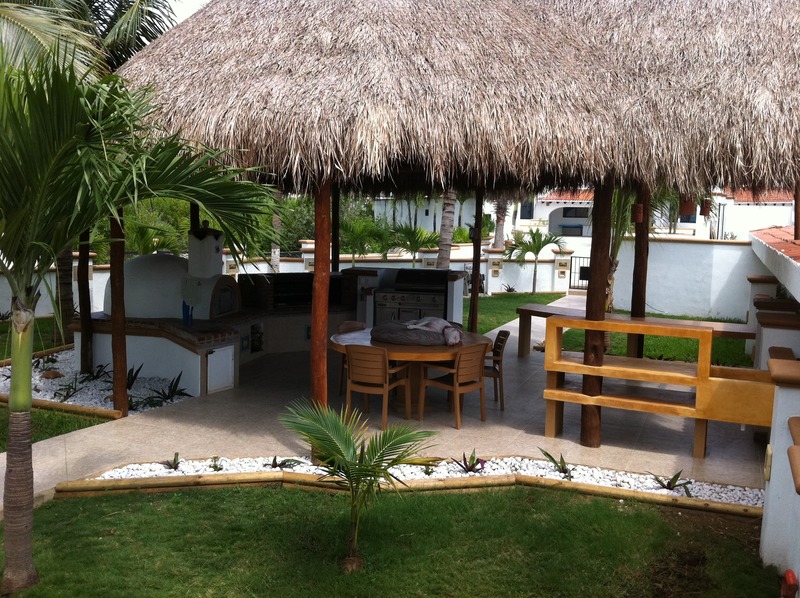 Puerto Morelos |Secret Beach Villas | Boat Villa | BBQ area under the Palapa