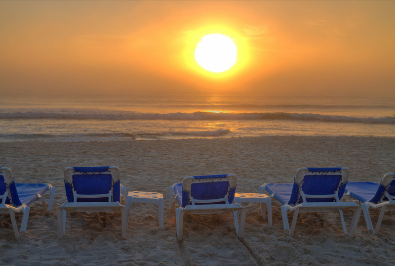 The Beach at Play del Secreto has white sand and the water is turquoise