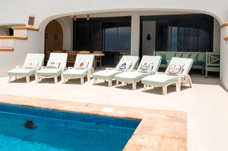 Puerto Morelos |Secret Beach Villas | Boat Villa |view of Outside Patio Dining table and Lounge Chairs